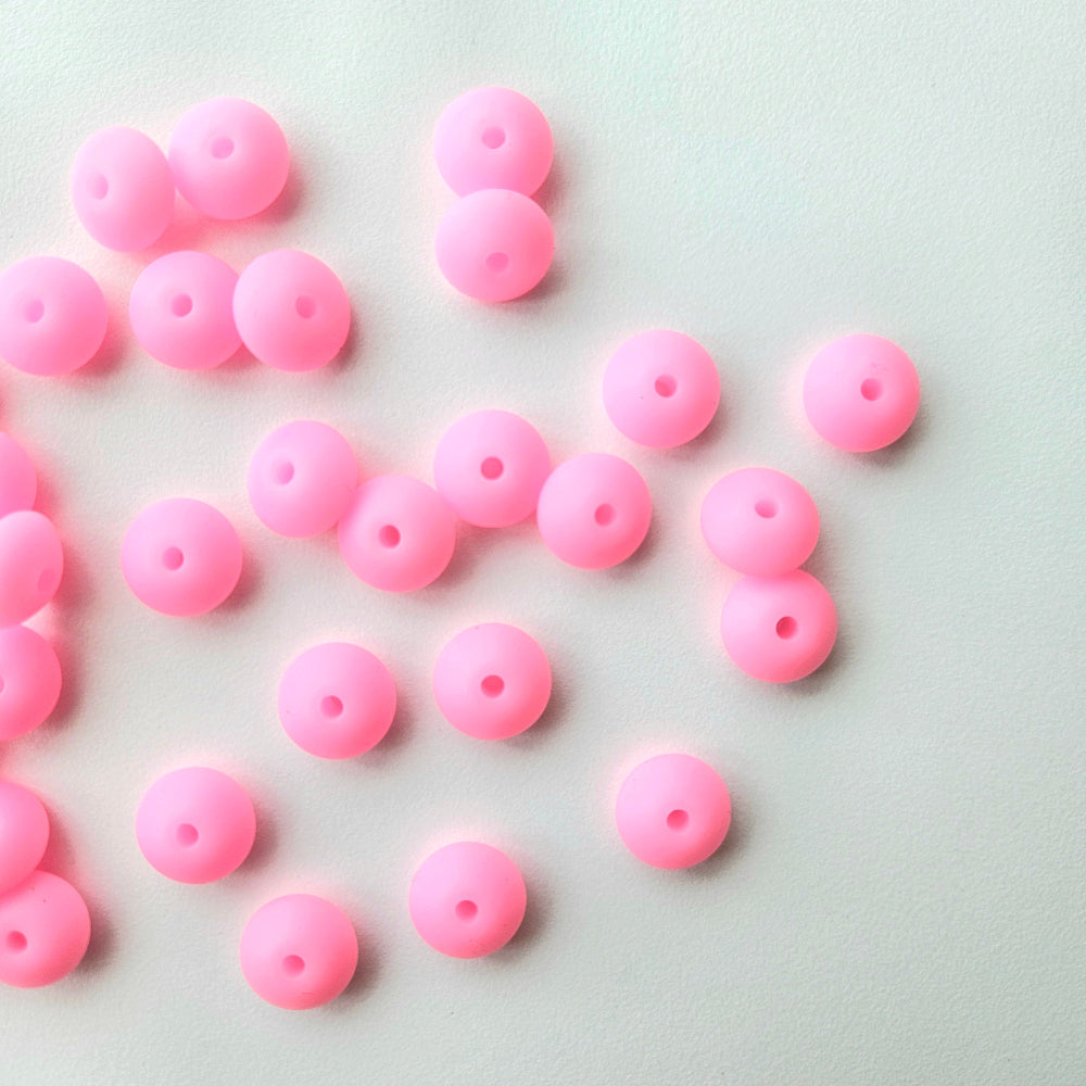 Pink Glow in the dark silicone lentil beads - Hey Beadly