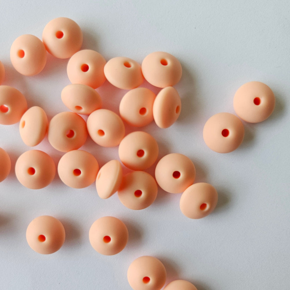 peachy silicone lentil beads - hey beadly