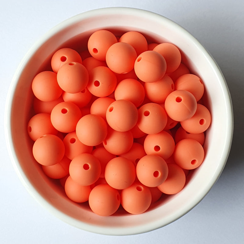 salmon orange round silicone beads - hey beadly