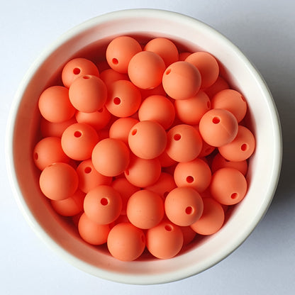 salmon orange round silicone beads - hey beadly