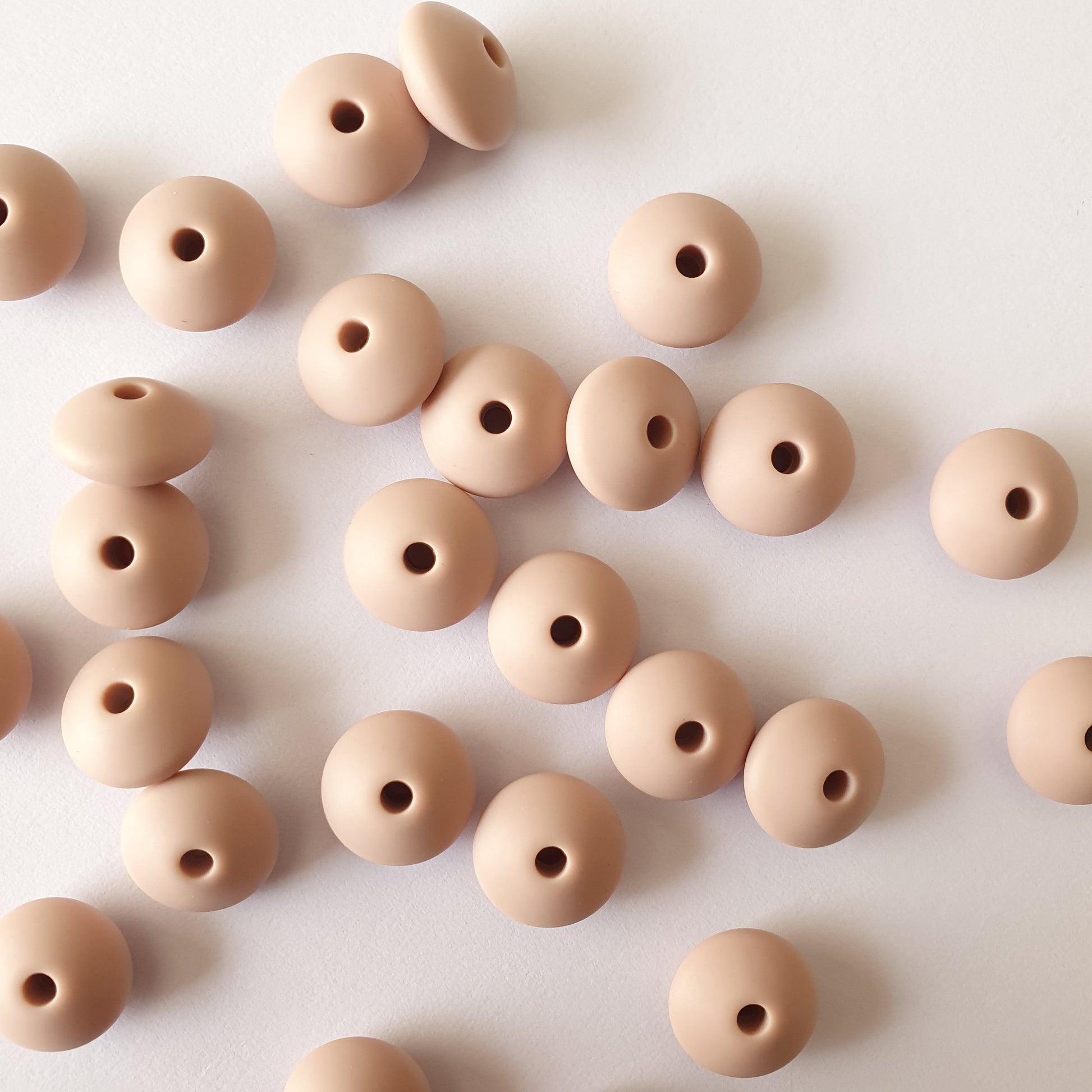 dusty pink lentil silicone beads