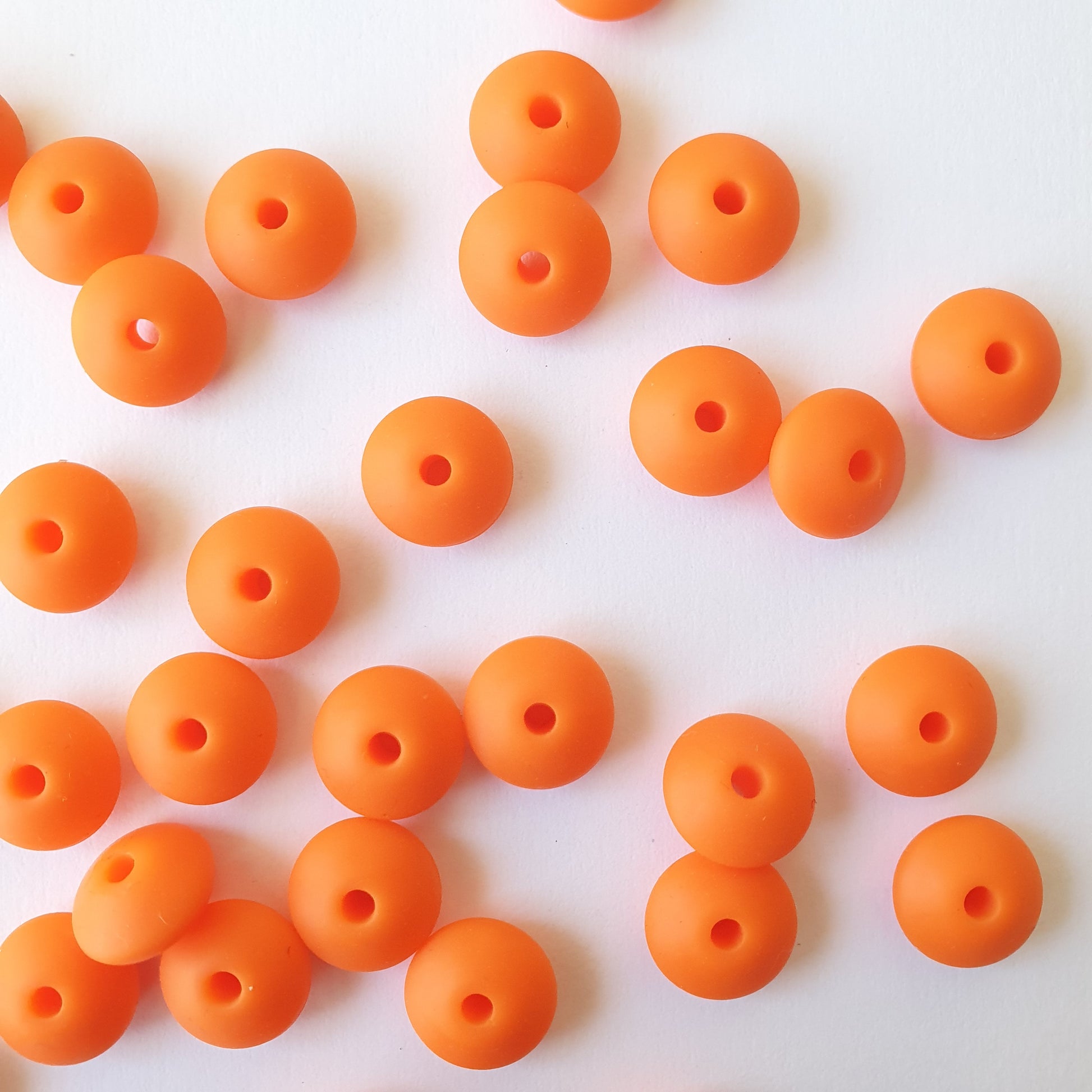 orange lentil silicone beads